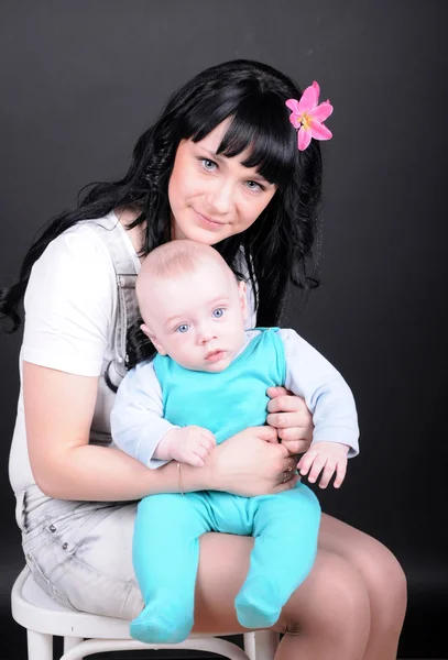 Beauty woman with newborn — Stock Photo, Image