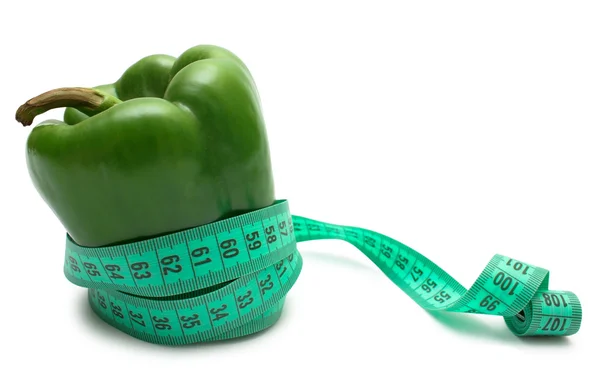 Diet: pepper tighten measuring tape isolated on white — Stock Photo, Image