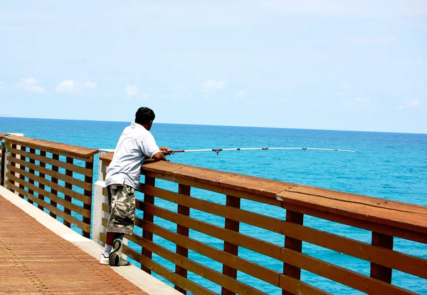 Men fishing on pier — Stock Photo, Image