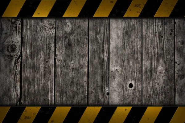 Wooden background with warning bar — Stock Photo, Image