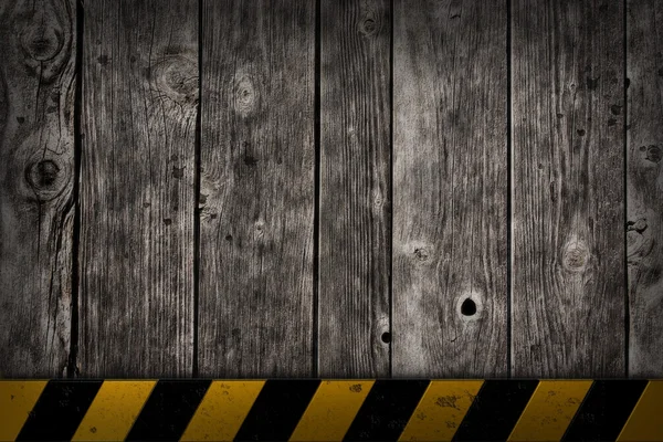 Wooden background with warning bar — Stock Photo, Image