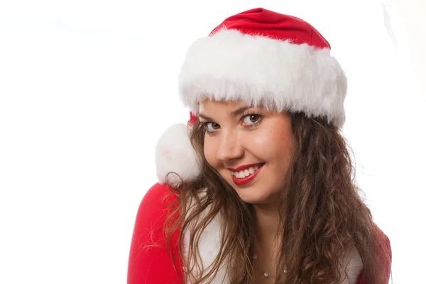Рождественская девушка в красной шляпе. Isolated . — стоковое фото