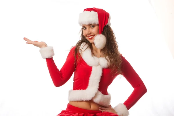Vánoční dívka v santa red hat. samostatný. — Stock fotografie