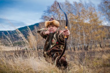 Kazakh, hungarian warrior whith bow. Hunter. clipart