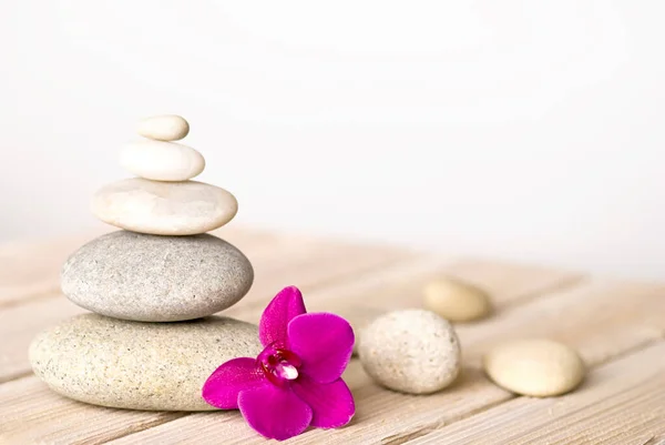 Zen Style Still Life Pink Orchid Flowers Stone Cairn Wooden — Stock Photo, Image