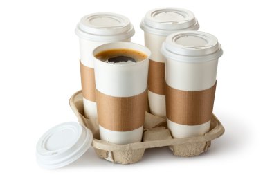 Four take-out coffee in holder. One cup is opened. clipart