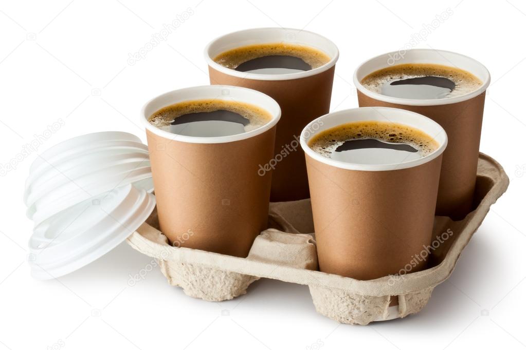 Four opened take-out coffee in holder