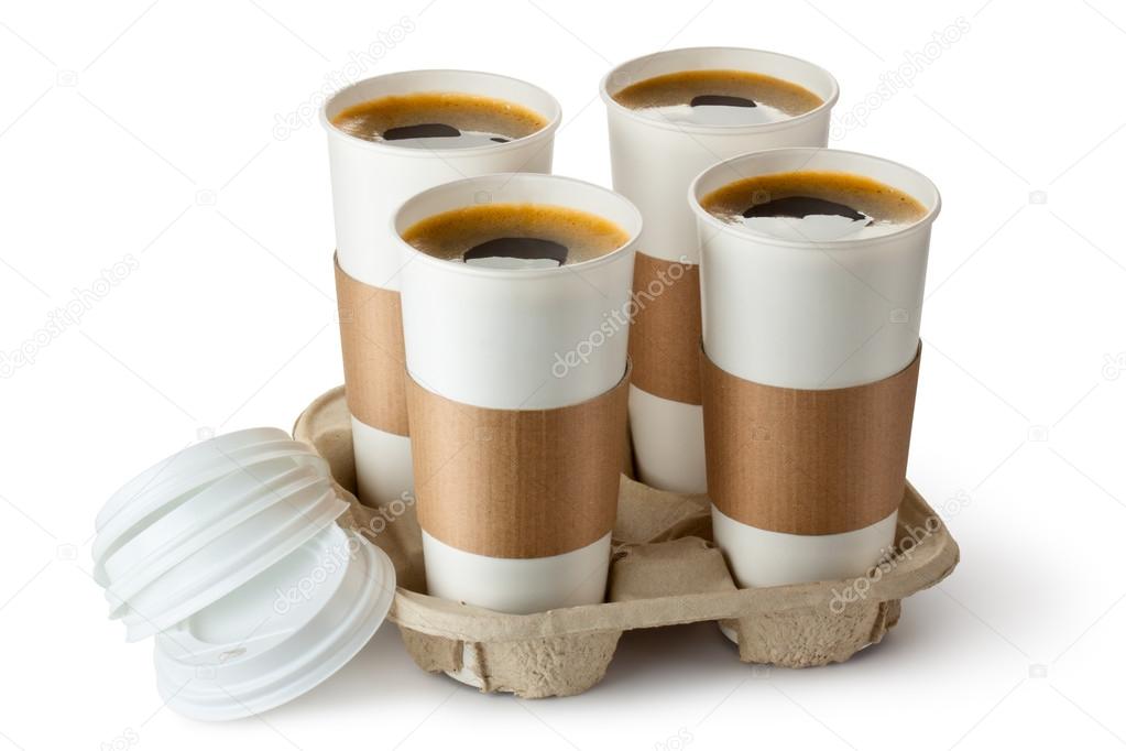 Four opened take-out coffee in holder