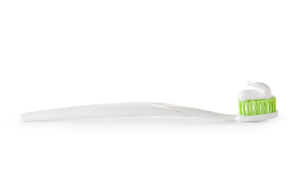 Zahnbürste mit gebrauchsfertiger Zahnpasta lizenzfreie Stockbilder