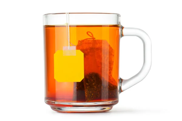 Glass cup with teabag — Stock Photo, Image