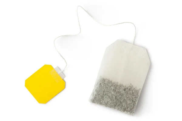Tepåse med gul etikett. ovanifrån. — Stockfoto