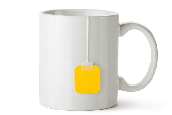 Tasse en céramique blanche avec étiquette en sachet de thé — Photo