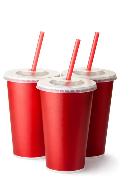 Three red cardboard cups with a straws — Stock Photo, Image