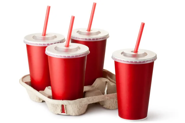 Quatro copos de takeout vermelho com um suporte de copo Fotografia De Stock