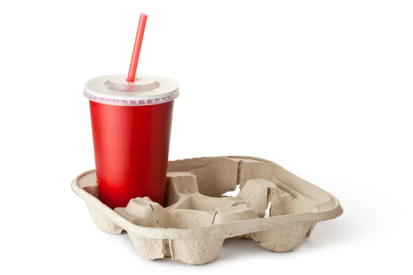 Красная картонная чашка в держателе чашки — стоковое фото
