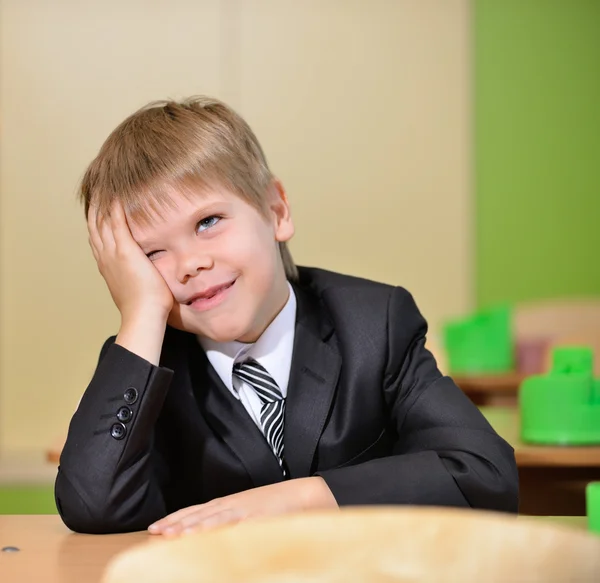 Tired schoolboy — Stock Photo, Image