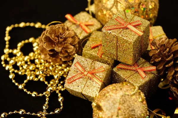 Gold box with gifts. — Stock Photo, Image