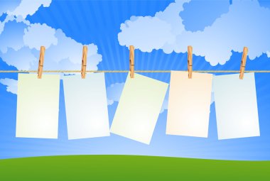 Kağıtları ip üzerinde.