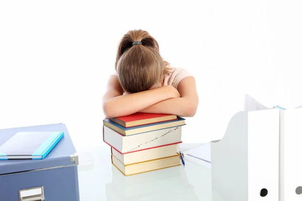 Student in slaap op een stapel boeken — Stockfoto