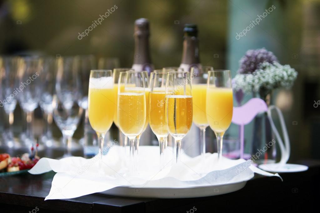 Flutes of champagne and orange juice