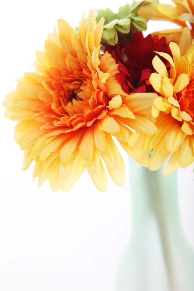 Orange dahlias in a vase — Stock Photo, Image