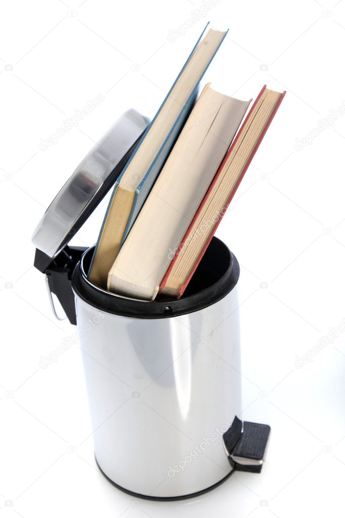 Waste paper bin filled with books Waste paper bin filled with books