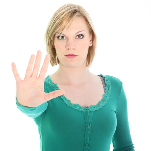 Resolute woman calling a halt with her hand — Stock Photo, Image