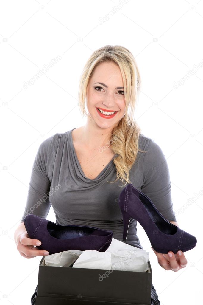 Blonde woman loves her new shoes Blonde woman with new shoes