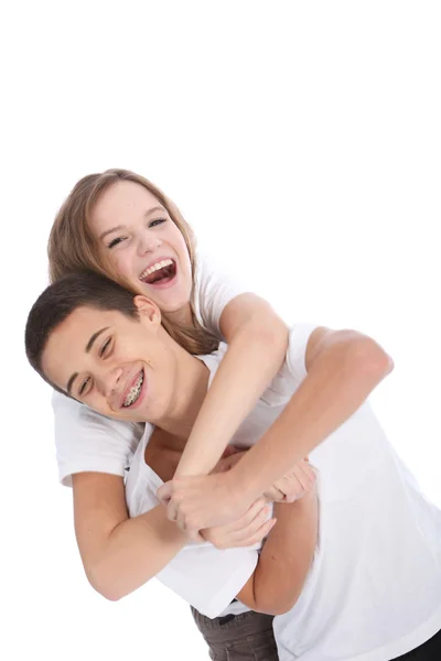 Laughing teenage brother and sister — Stock Photo, Image