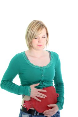 Woman suffering from a stomach ache clipart