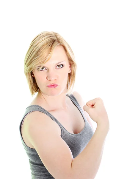 Kvinnan visar upp hennes biceps kvinna visar upp hennes biceps — Stockfoto