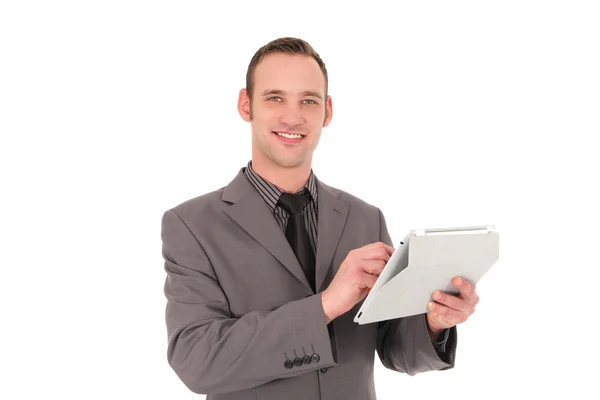 Homem de negócios segurando um tablet Empresário elegante com um tablet — Fotografia de Stock