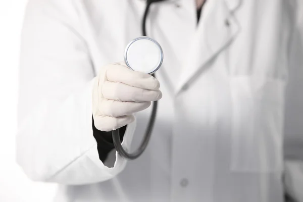 Doctor holding a stethoscope — Stock Photo, Image