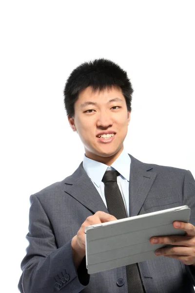 Happy businessman touching a PC tablet Royalty Free Stock Photos