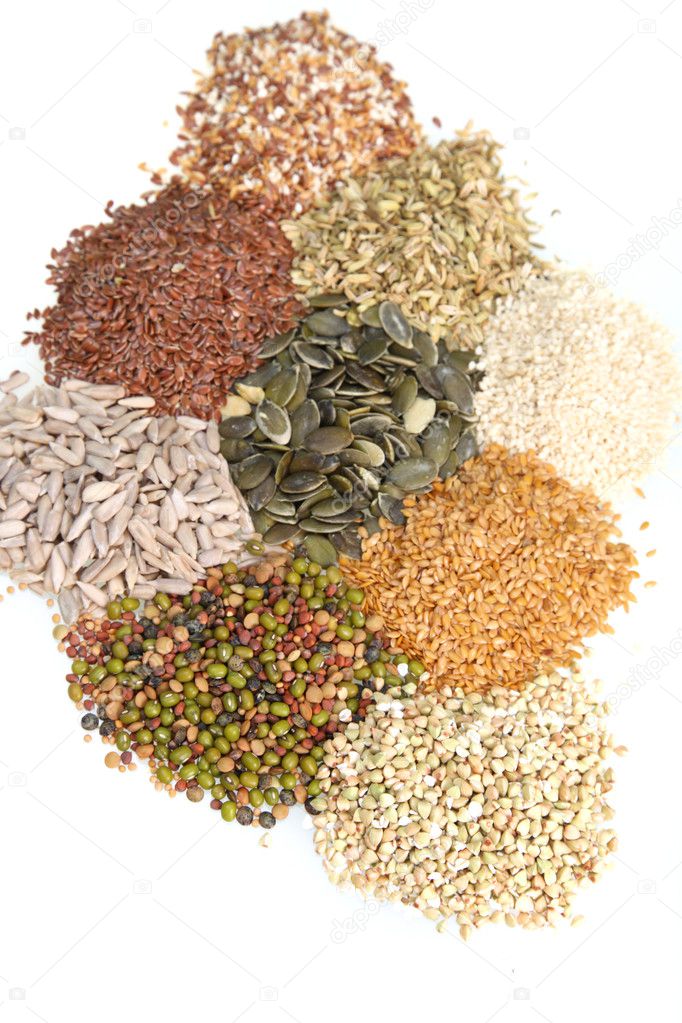 Mixed seeds arranged on a white background