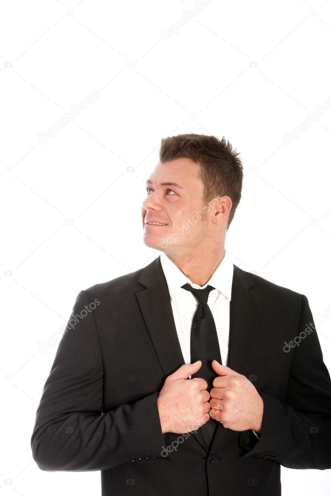 Smiling businessman looking up