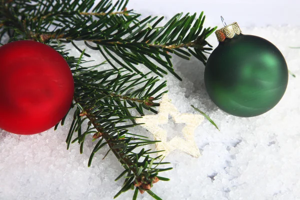 Pine needles and baubles — Stock Photo, Image