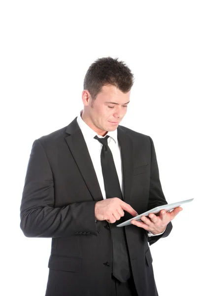 Бизнесмен с помощью планшета с сенсорным экраном — стоковое фото