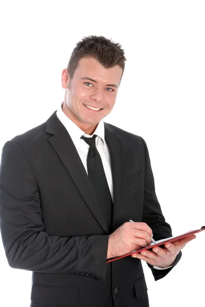 Homme d'affaires confiant avec un presse-papiers Photo De Stock