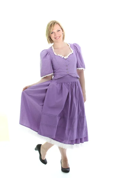 Blond meisje en dirndl jurk — Stockfoto