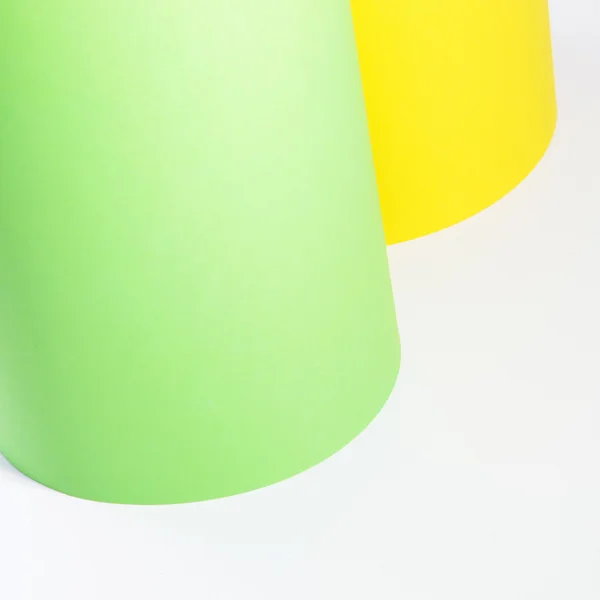 Rolls of yellow and green cardboard — Stock Photo, Image