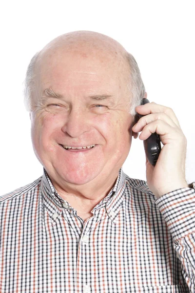 Homem sênior rindo enquanto fala ao telefone — Fotografia de Stock