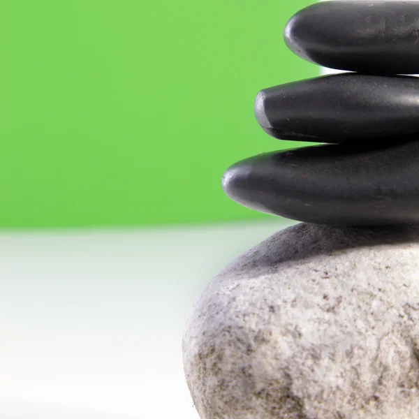 Smooth black spa stones — Stock Photo, Image