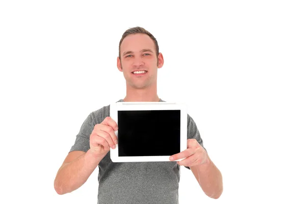 젊은 남자가 그의 태블릿을 보여주는 미소 — 스톡 사진