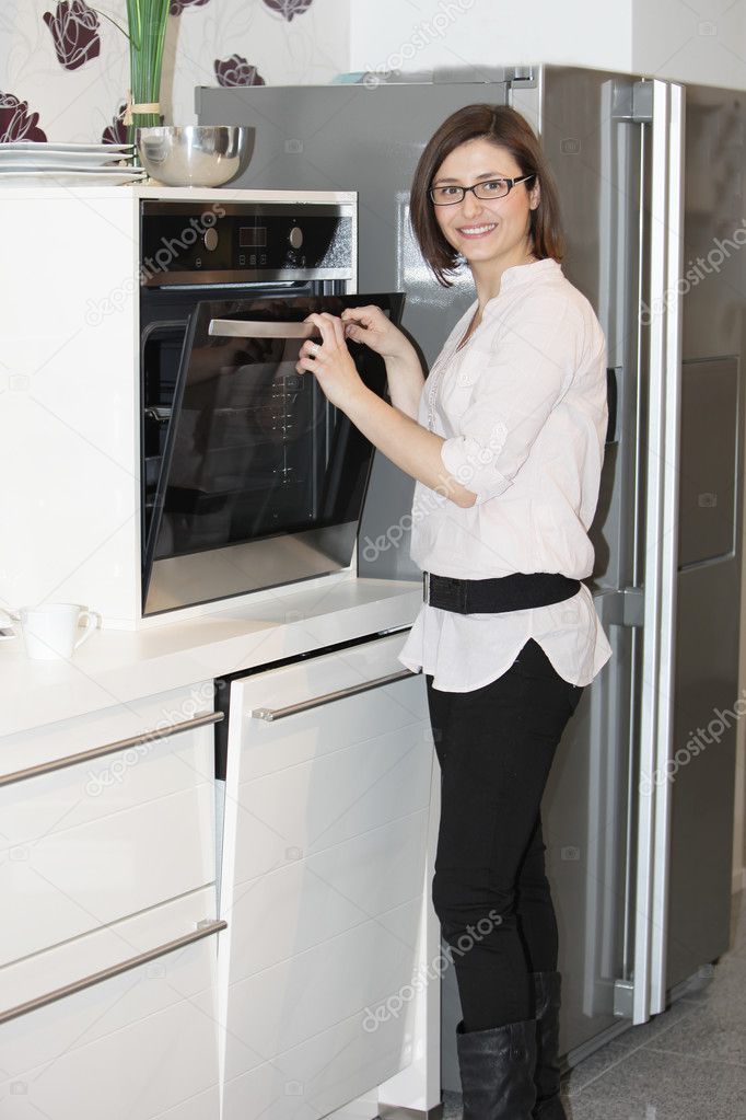 Stylish young woman cooking