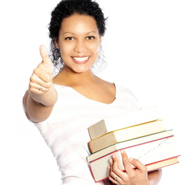Mulher carregando livros didáticos dando um polegar para cima — Fotografia de Stock
