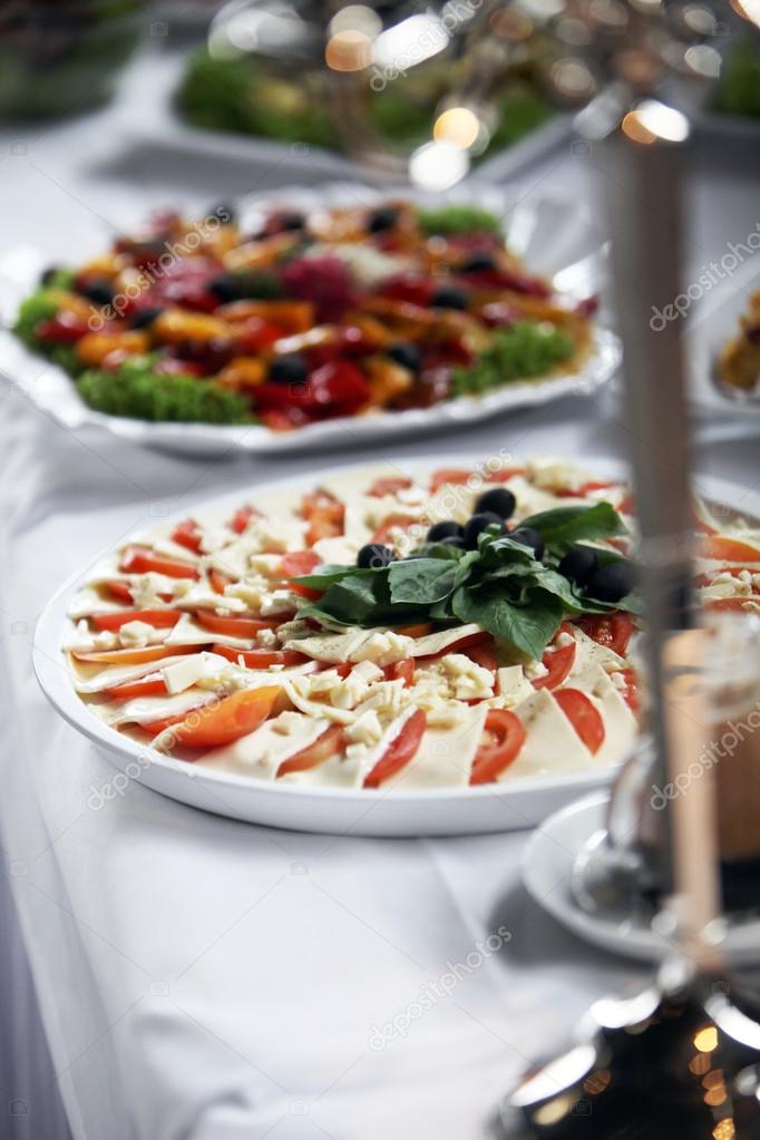 Platter of mozzarella cheese and tomato