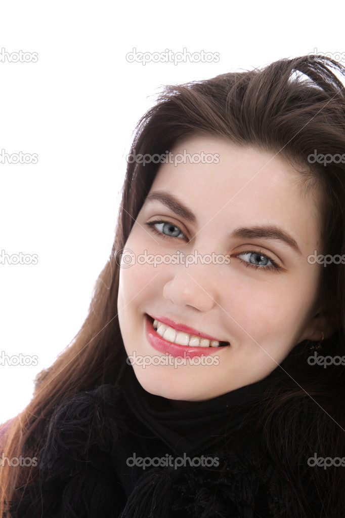 Blue eyed happy young woman looking at camera