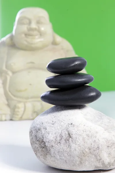 Three black stones stacked on top of each other — Stock Photo, Image