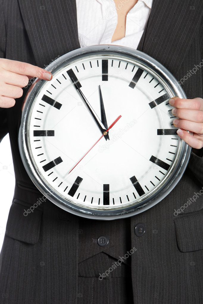 Woman holding a clock